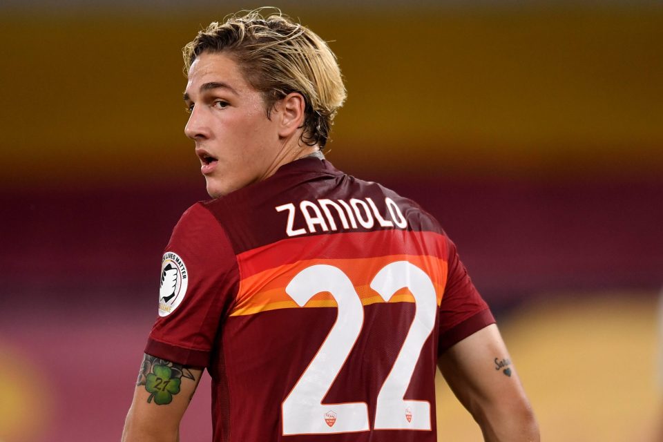 Nicolo' Zaniolo of AS Roma looks dejected receiving a red card