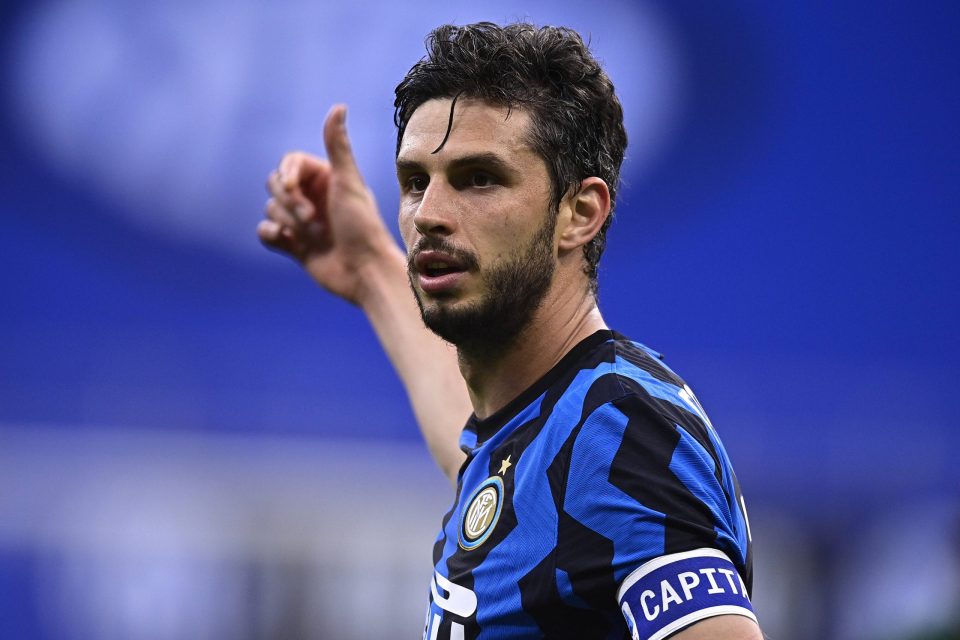 Inter Milan defender Andrea Ranocchia, right, challenges AC Milan