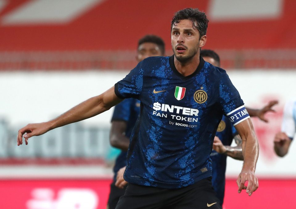 Inter Milan defender Andrea Ranocchia, right, challenges AC Milan