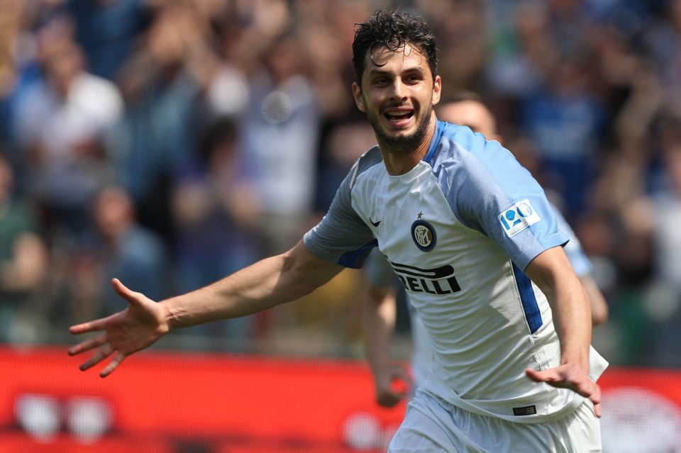 Inter Milan defender Andrea Ranocchia, right, challenges AC Milan